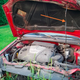 Illustration for article titled Why The Datsun 510s Hood Prop Rod Was Perfect